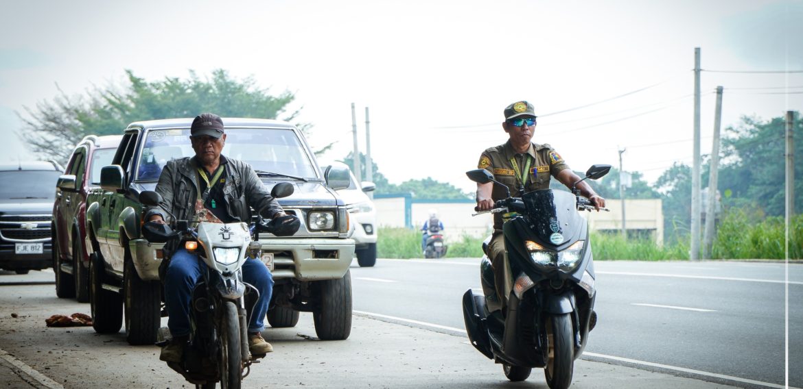 Motorcade along Sayre Highway